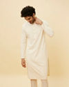 alt message - Manyavar Men Soft White Floral Sequin Embroidered Kurta Set image number 0